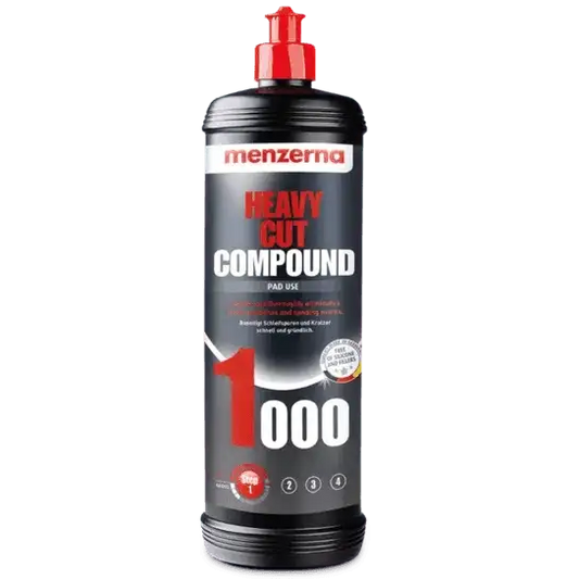 Menzerna Heavy Cut Compound 1000 for paint correction, shown on a vehicle's surface, used for finishing and polishing automotive paint.